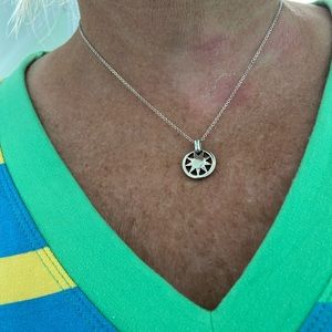 Tiffany & Co— Sun necklace pendant